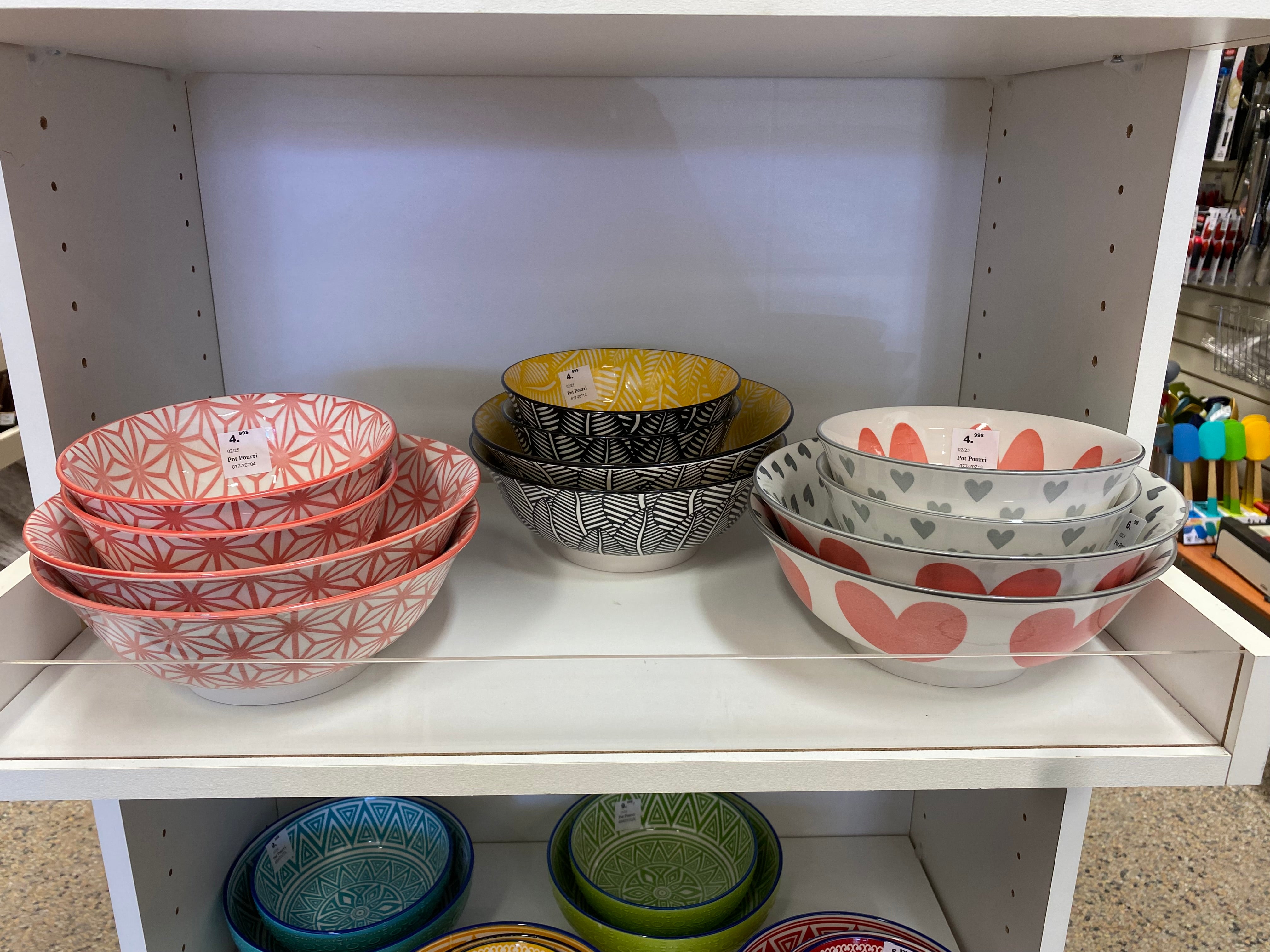 BOL FEUILLES NOIR/JAUNE 21 CM